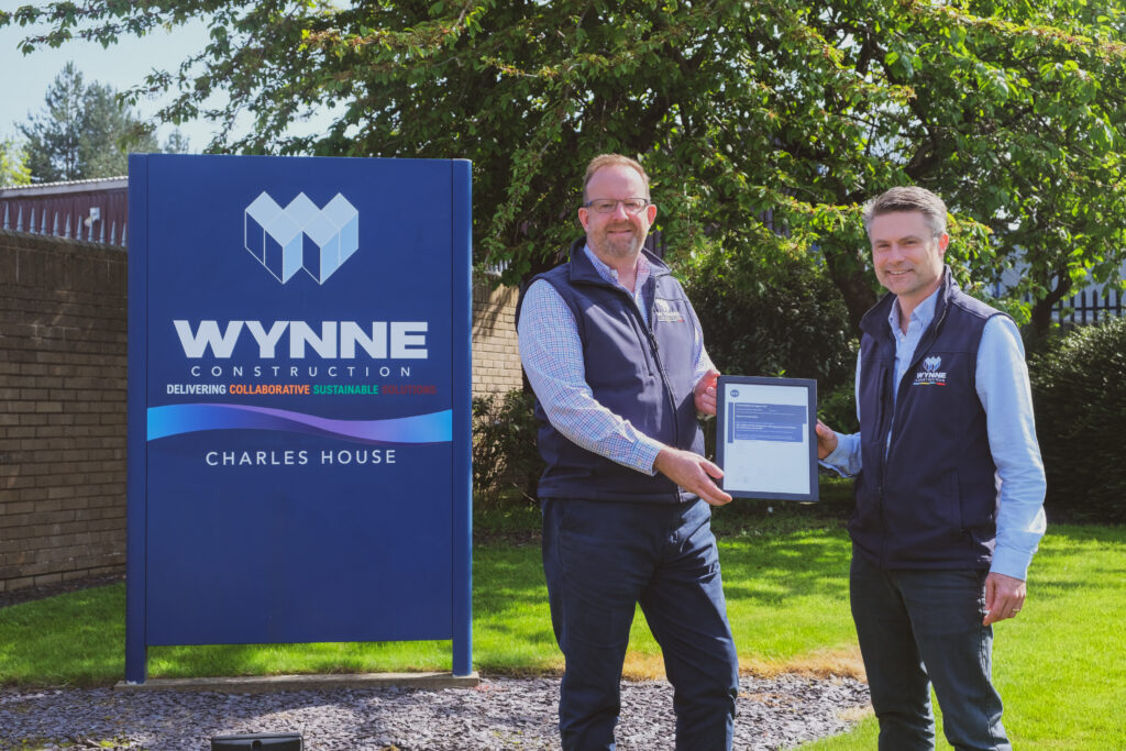 Wynne Construction accepting ISO 19659 certificate at Wynne head quarters